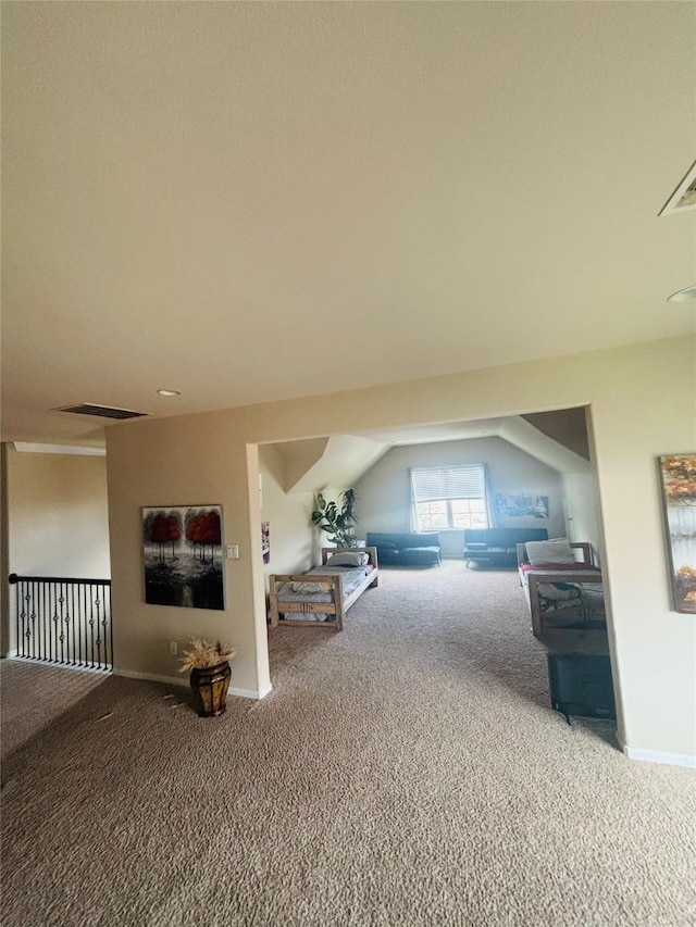 9615 Emerald Briar Ln, Rosenberg, TX 77469 - carpeted living room with baseboards and vaulted ceiling
