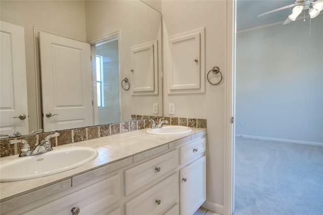 4035 Gramercy St, Houston, TX 77025 - bathroom featuring double vanity and ceiling fan