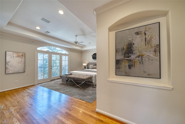 4035 Gramercy St, Houston, TX 77025 - bedroom featuring access to outside, wood finished floors, a raised ceiling, recessed lighting, and ceiling fan