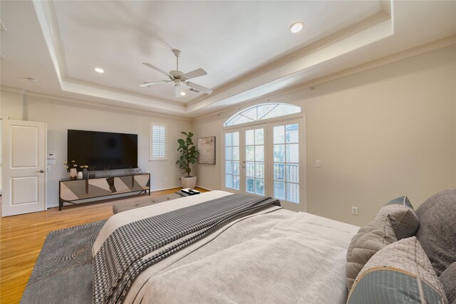 4035 Gramercy St, Houston, TX 77025 - bedroom featuring a raised ceiling, light wood-style flooring, french doors, recessed lighting, and ceiling fan