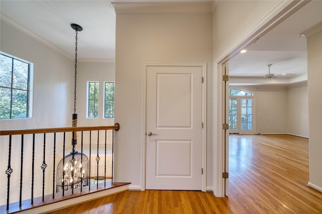 4035 Gramercy St, Houston, TX 77025 - corridor featuring wood finished floors and ornamental molding