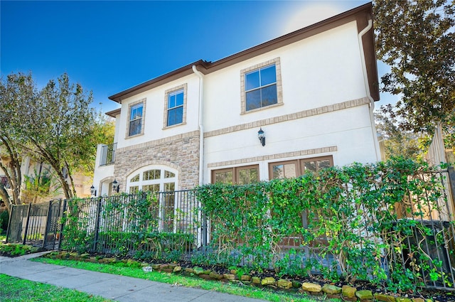 4035 Gramercy St, Houston, TX 77025 - view of front of house featuring stucco siding and stone siding