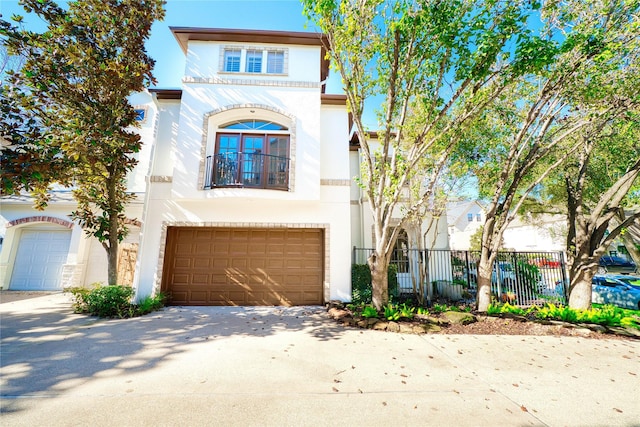4035 Gramercy St, Houston, TX 77025 - view of front of property featuring stucco siding, concrete driveway, and an attached garage