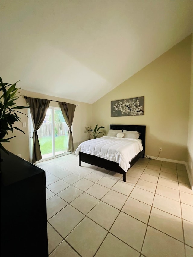 6404 Quail Meadow Dr, Houston, TX 77035 - bedroom featuring vaulted ceiling, light tile patterned flooring, and access to exterior
