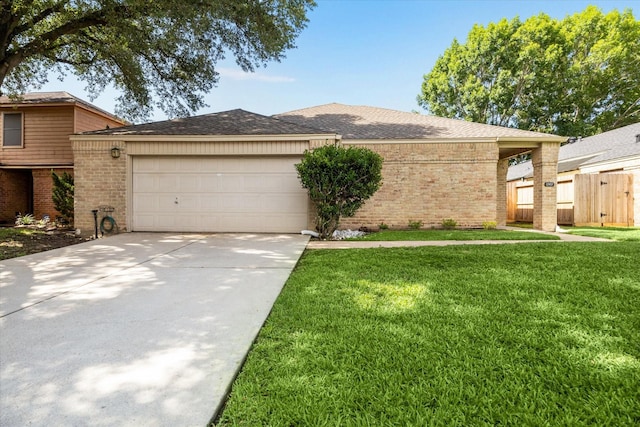 12907 Avenida Vaquero St, Houston, TX 77077 - view of front of home featuring brick siding, a garage, driveway, and a shingled roof