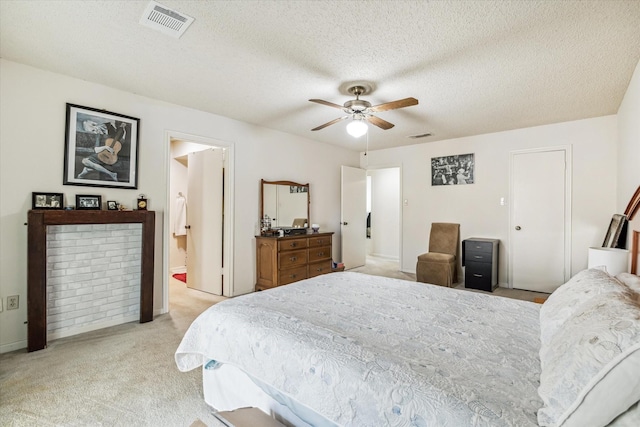 12907 Avenida Vaquero St, Houston, TX 77077 - bedroom featuring light carpet, a ceiling fan, and a textured ceiling