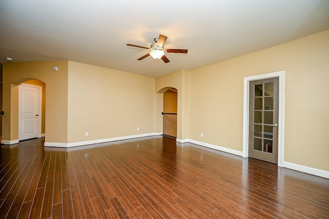 27814 Cenizo Park Ct, Katy, TX 77494 - empty room with arched walkways, ceiling fan, and wood finished floors