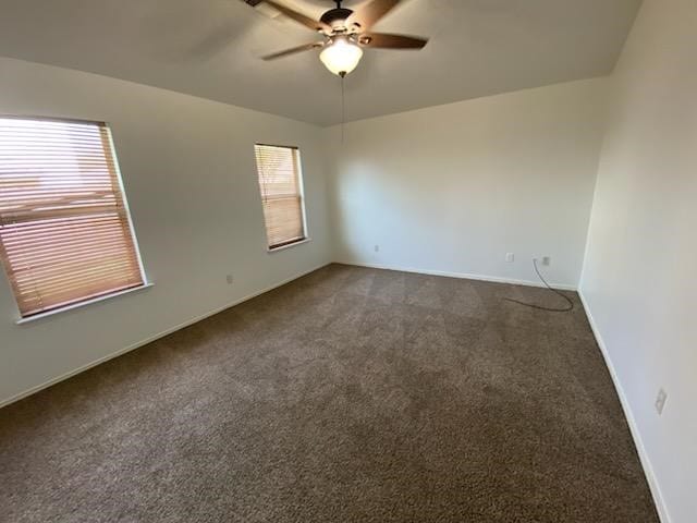 9530 Alex Springs Ln, Houston, TX 77044 - unfurnished room featuring a ceiling fan and dark colored carpet