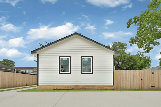 7939 Goode St, Houston, TX 77012 - view of home's exterior with a patio area