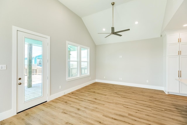 591 Pompano Dr, Freeport, TX 77541 - empty room featuring ceiling fan, light wood finished floors, and high vaulted ceiling