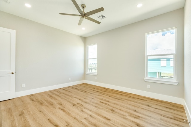 591 Pompano Dr, Freeport, TX 77541 - unfurnished room featuring healthy amount of natural light, wood finished floors, a ceiling fan, and recessed lighting
