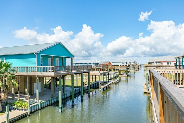 591 Pompano Dr, Freeport, TX 77541 - dock area featuring a deck with water view