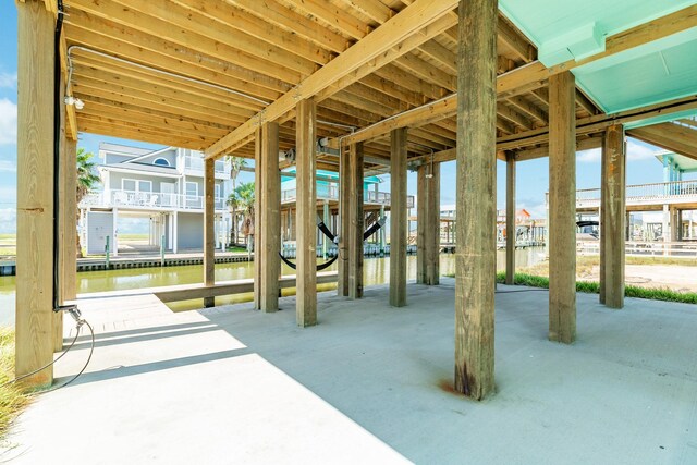 591 Pompano Dr, Freeport, TX 77541 - view of patio featuring a water view