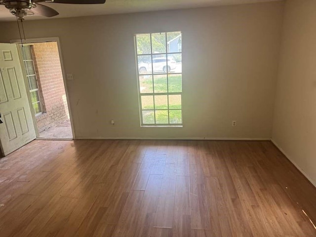 5739 Gatewood Ave, Houston, TX 77053 - empty room with ceiling fan and wood finished floors