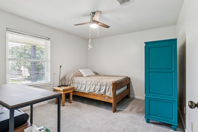 7927 Litchfield Ln, Spring, TX 77379 - bedroom featuring light carpet and ceiling fan