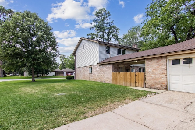 7927 Litchfield Ln, Spring, TX 77379 - view of side of property featuring brick siding and driveway