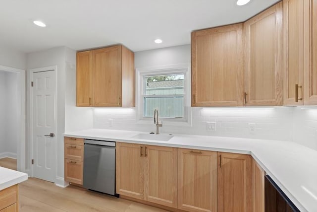 4406 Merwin St, Houston, TX 77027 - kitchen featuring dishwasher, decorative backsplash, light brown cabinetry, light countertops, and light wood-type flooring
