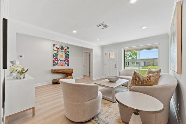 4406 Merwin St, Houston, TX 77027 - living room with light wood-type flooring, recessed lighting, and ornamental molding