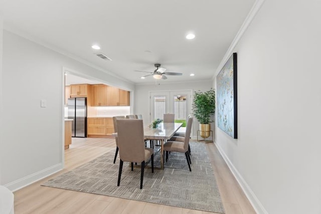 4406 Merwin St, Houston, TX 77027 - dining space with a ceiling fan, ornamental molding, light wood-style flooring, and recessed lighting