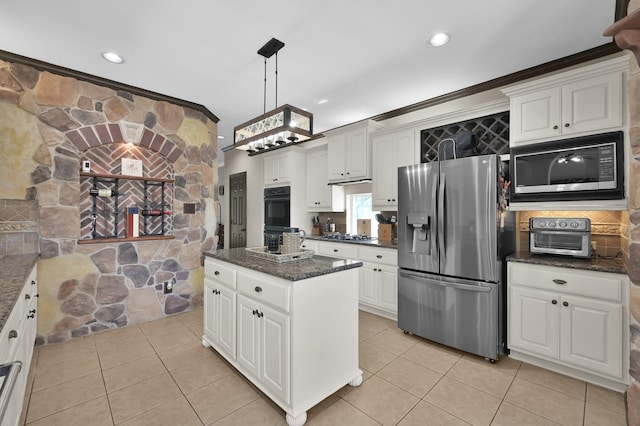 1415 Kennoway Park Dr, Spring, TX 77379 - kitchen with black appliances, light tile patterned floors, white cabinets, tasteful backsplash, and recessed lighting
