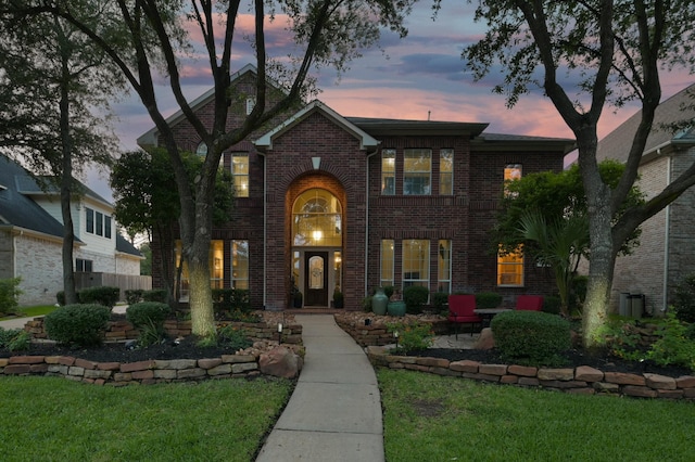 1415 Kennoway Park Dr, Spring, TX 77379 - traditional-style house featuring brick siding and a front yard