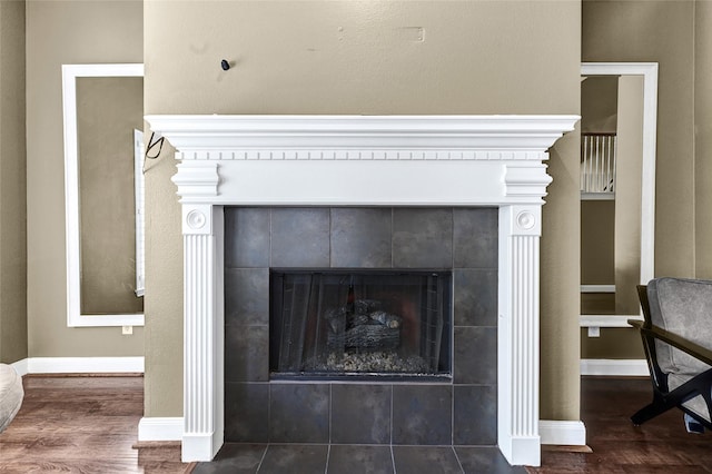 13322 Castlecombe Dr, Houston, TX 77044 - detailed view of a tiled fireplace and wood finished floors