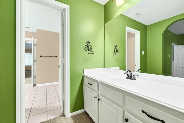 13322 Castlecombe Dr, Houston, TX 77044 - bathroom with vanity, tile patterned floors, and a textured wall