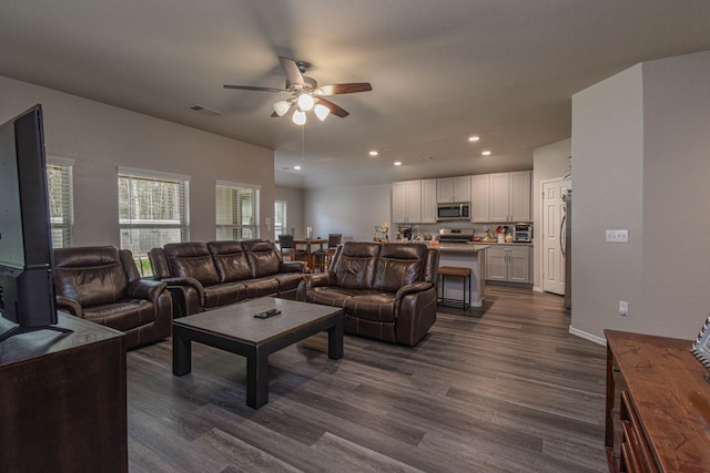 9971 Spring Creek Rd, Cleveland, TX 77327 - living area with ceiling fan, dark wood-style floors, and recessed lighting