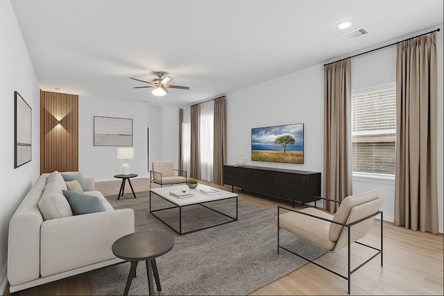 23330 Wise Walk Dr, Katy, TX 77493 - living room featuring ceiling fan, light wood-style floors, and healthy amount of natural light