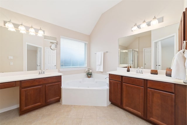 12714 Madera Canyon Ln, Tomball, TX 77377 - bathroom featuring a shower stall, two vanities, a jetted tub, lofted ceiling, and tile patterned flooring