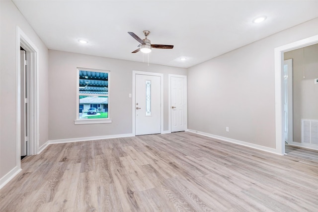 5858 Beldart St, Houston, TX 77033 - entryway featuring ceiling fan, light wood-type flooring, and recessed lighting