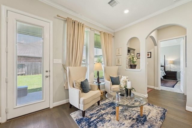 2018 Oxley Manor Ln, Richmond, TX 77469 - sitting room featuring crown molding, wood finished floors, arched walkways, and recessed lighting