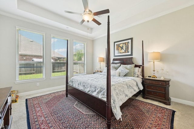 2018 Oxley Manor Ln, Richmond, TX 77469 - carpeted bedroom with a raised ceiling, crown molding, and ceiling fan
