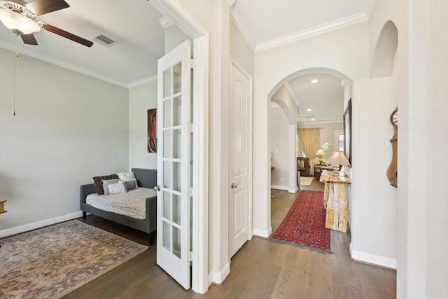 2018 Oxley Manor Ln, Richmond, TX 77469 - hallway featuring crown molding, wood finished floors, arched walkways, and recessed lighting