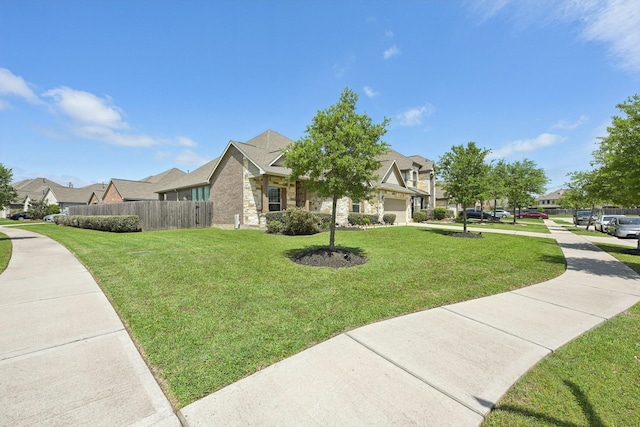 2018 Oxley Manor Ln, Richmond, TX 77469 - view of front of property featuring a residential view and stone siding