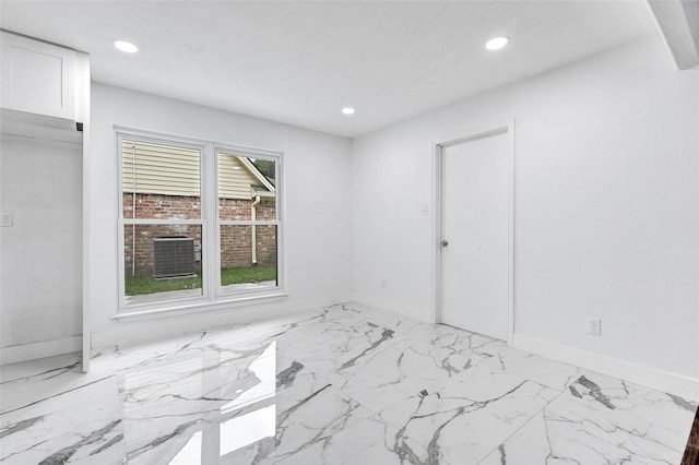 15702 Congo Ln, Jersey Village, TX 77040 - spare room with light marble finish floors and recessed lighting
