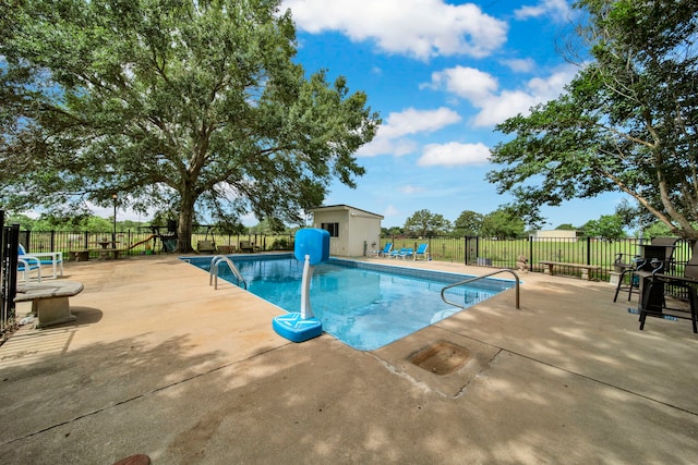 40670 Jozwiak Ln, Hempstead, TX 77445 - view of swimming pool with a patio and an outdoor structure