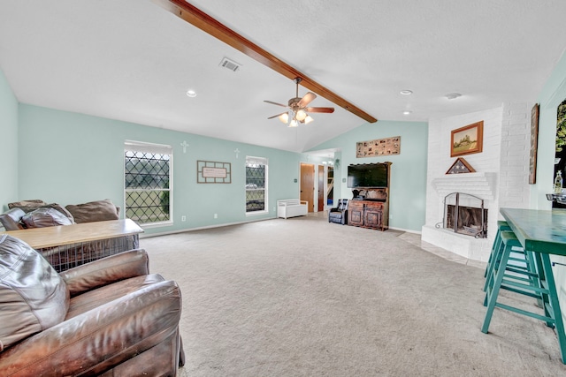 40670 Jozwiak Ln, Hempstead, TX 77445 - carpeted living room with a brick fireplace and ceiling fan