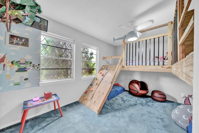 40670 Jozwiak Ln, Hempstead, TX 77445 - carpeted bedroom with a ceiling fan and baseboards