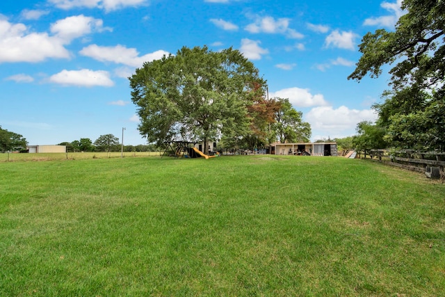 40670 Jozwiak Ln, Hempstead, TX 77445 - view of grassy yard featuring a playground