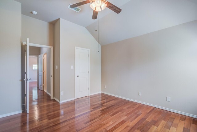6103 Timbermoss Ct, League City, TX 77573 - unfurnished bedroom with wood finished floors, high vaulted ceiling, and ceiling fan
