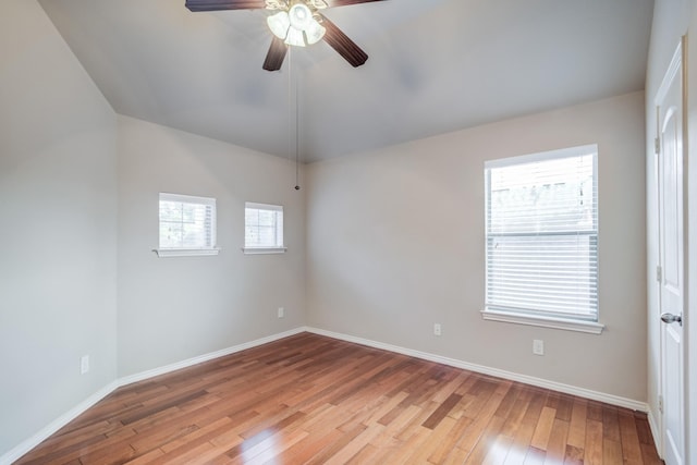 6103 Timbermoss Ct, League City, TX 77573 - empty room featuring a ceiling fan, light wood-type flooring, and lofted ceiling