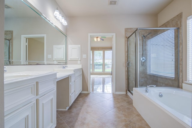 6103 Timbermoss Ct, League City, TX 77573 - bathroom featuring double vanity, a shower stall, a bath, tile patterned flooring, and a ceiling fan