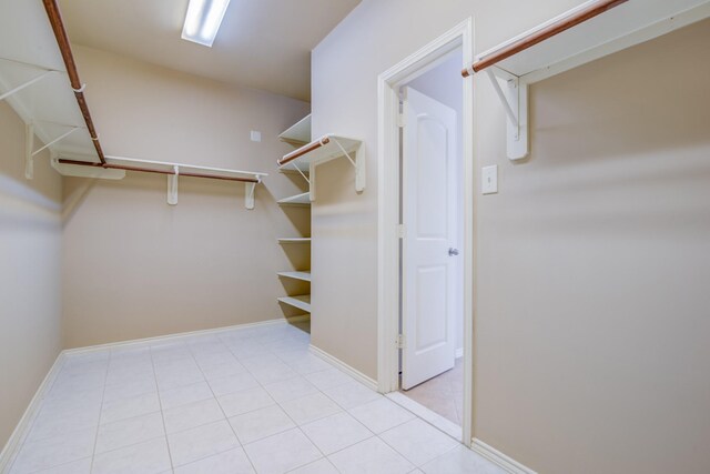 6103 Timbermoss Ct, League City, TX 77573 - spacious closet with light tile patterned floors