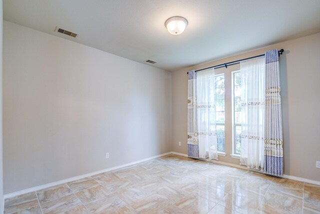 6103 Timbermoss Ct, League City, TX 77573 - empty room with healthy amount of natural light