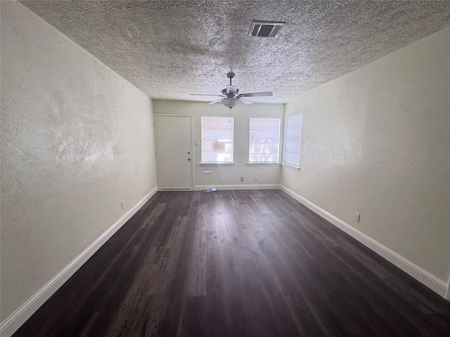 10124 Homestead Rd, Houston, TX 77016 - unfurnished dining area featuring wood finished floors, ceiling fan, a textured wall, and a textured ceiling