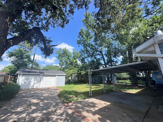 10124 Homestead Rd, Houston, TX 77016 - view of yard with an outbuilding and a detached garage