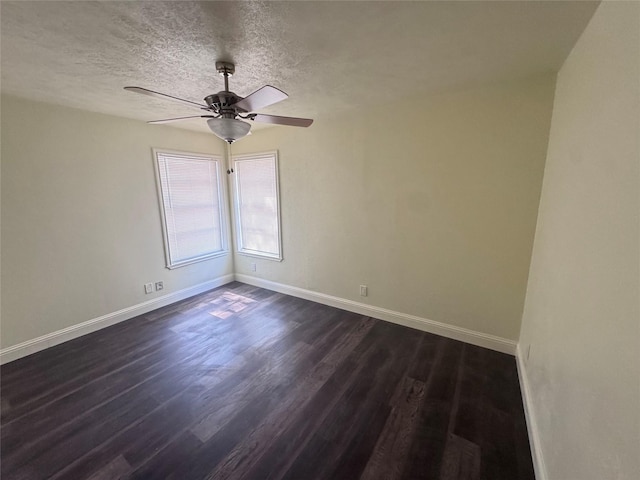 10124 Homestead Rd, Houston, TX 77016 - unfurnished room with ceiling fan, dark wood-type flooring, and a textured ceiling