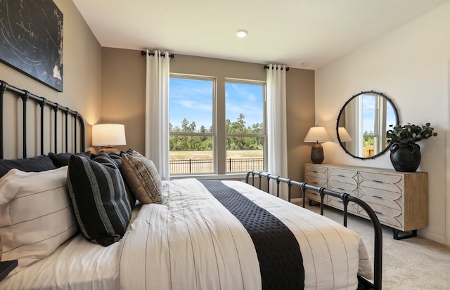 16415 Windy Cove Ct, Conroe, TX 77302 - bedroom with carpet flooring, multiple windows, and recessed lighting
