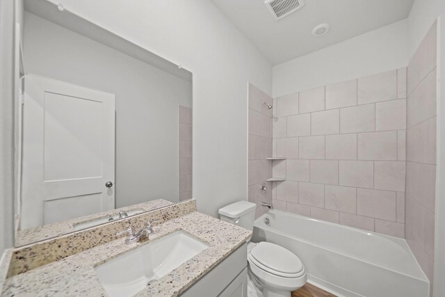 10713 Blocker Ct, Bryan, TX 77801 - full bathroom featuring vanity and tub / shower combination